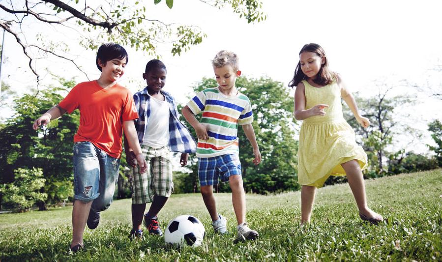 Children playing soccer